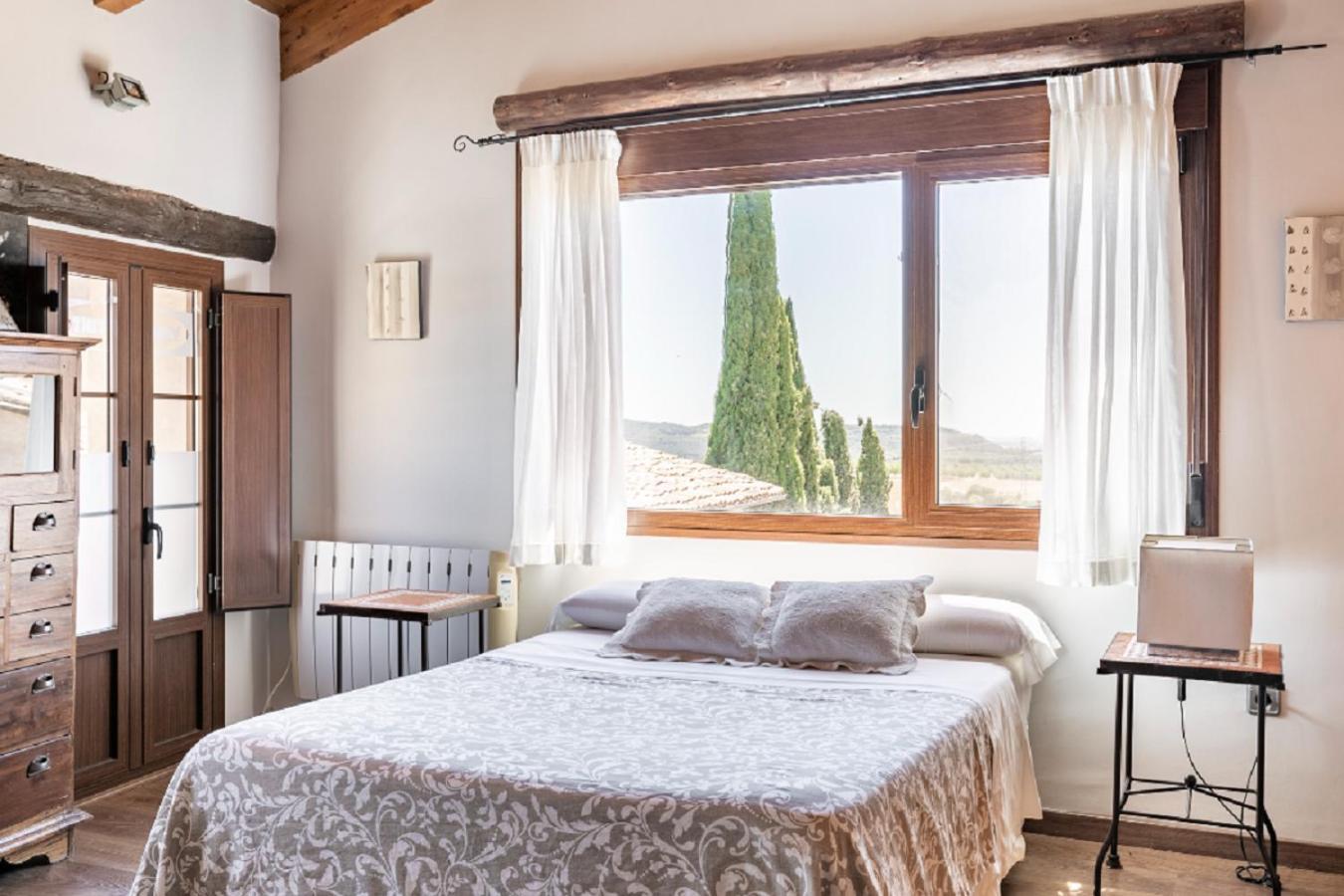 Apartamentos Vino Tinto Y Restaurante Tomate Rosa Adahuesca Kültér fotó
